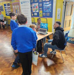 Faresh Maisuria and Reza Khatoonabadi at Rothwell Victoria Primary School for Positive Footprints’ Raising Aspirations programme.